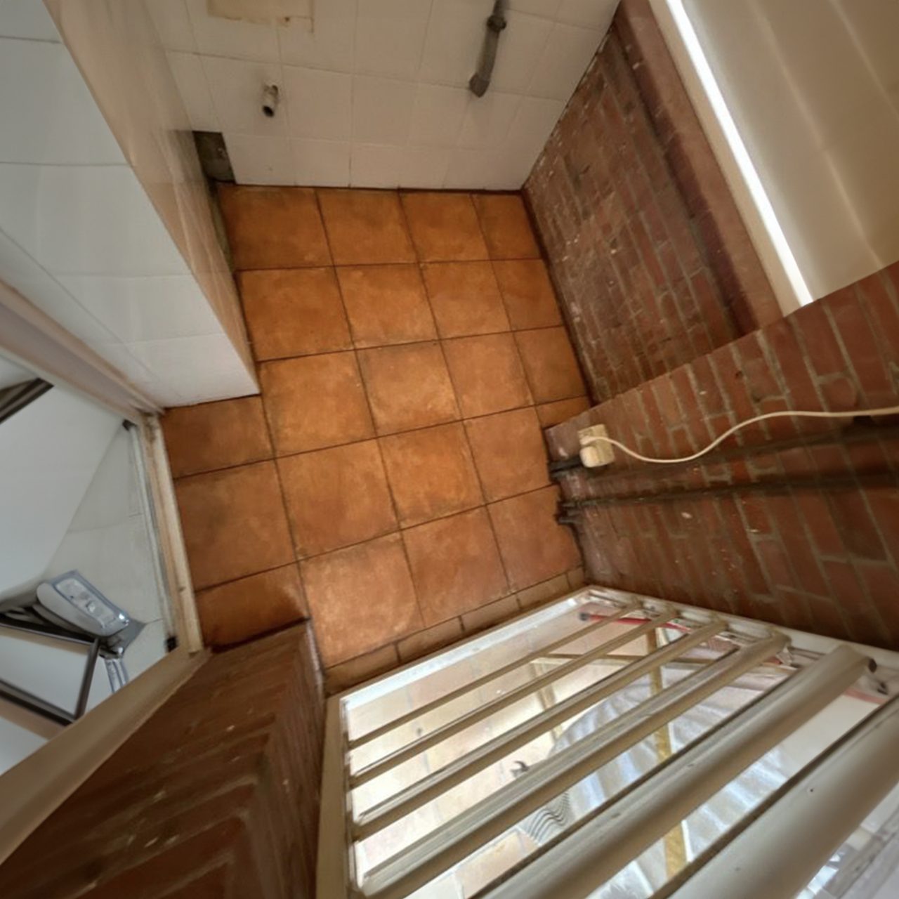 Cambio suelo lavadero